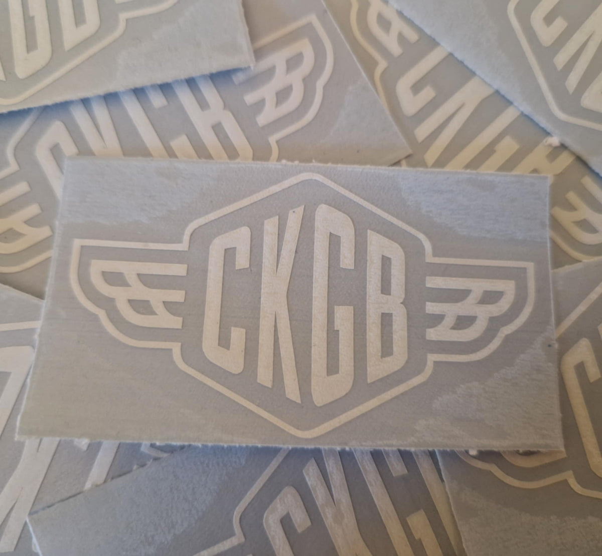 Official CKGB Badge White Vinyl Sticker